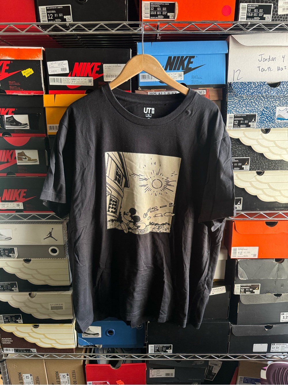 Uniqlo Black Short-Sleeve Tee with Beige Graphic